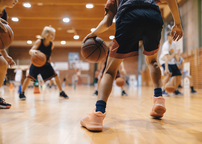 Kid playing basketball